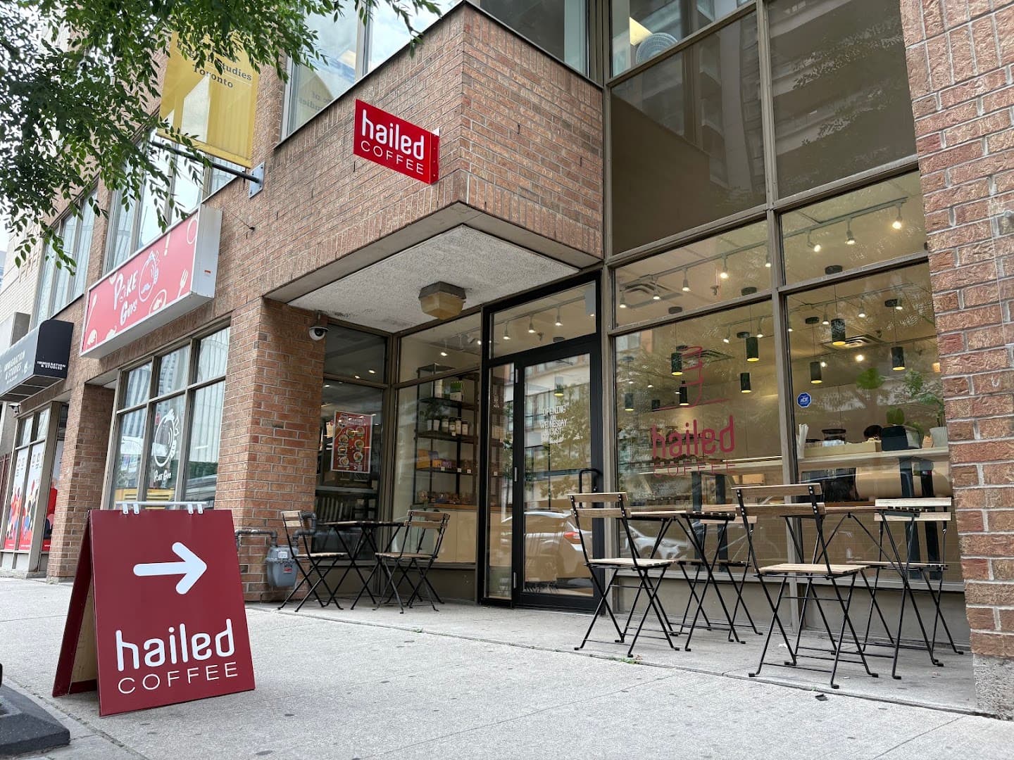 Storefront of Hailed Coffee - Elizabeth St., specialty coffee shop in Toronto