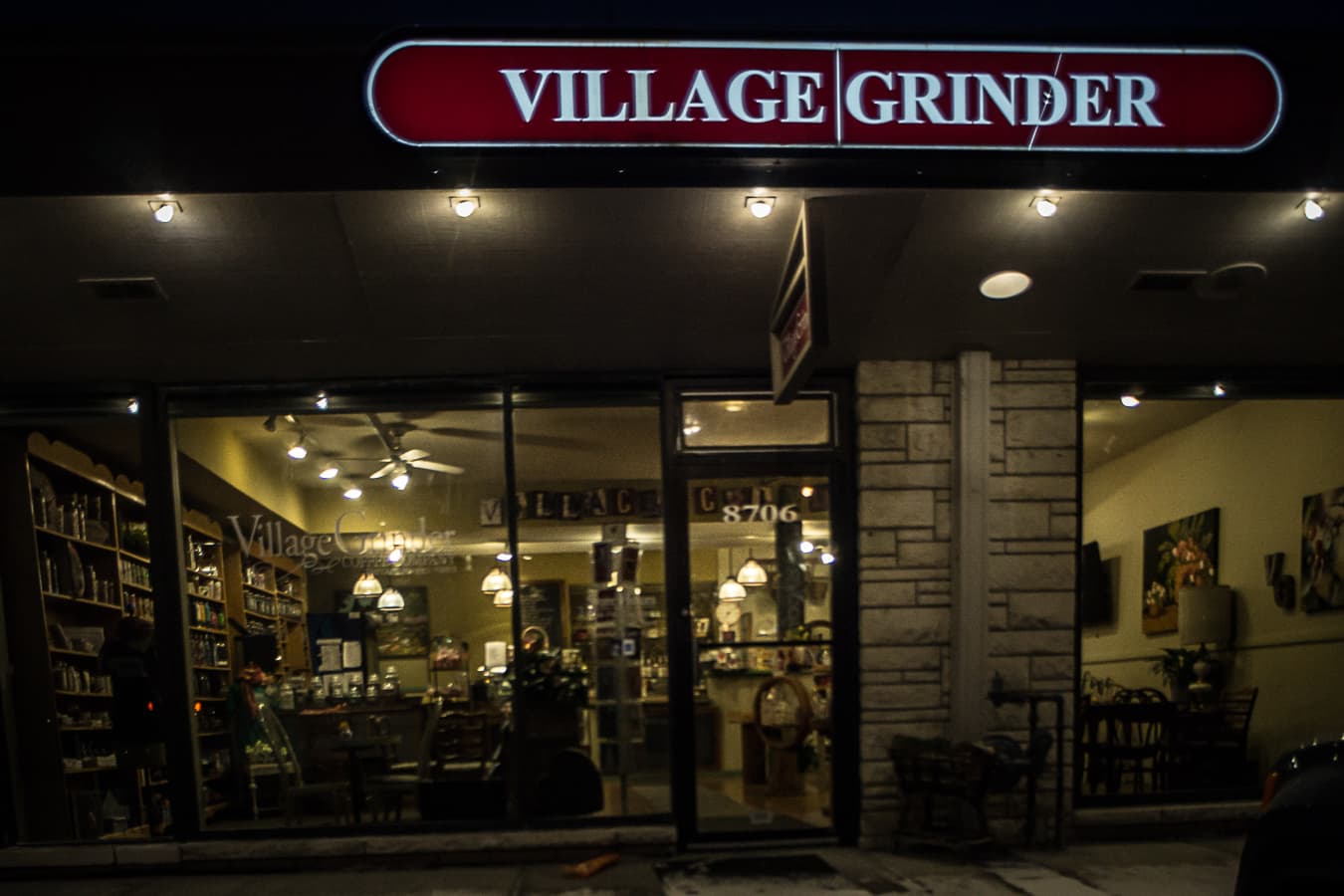 Storefront of Village Grinder, specialty coffee shop in Omaha