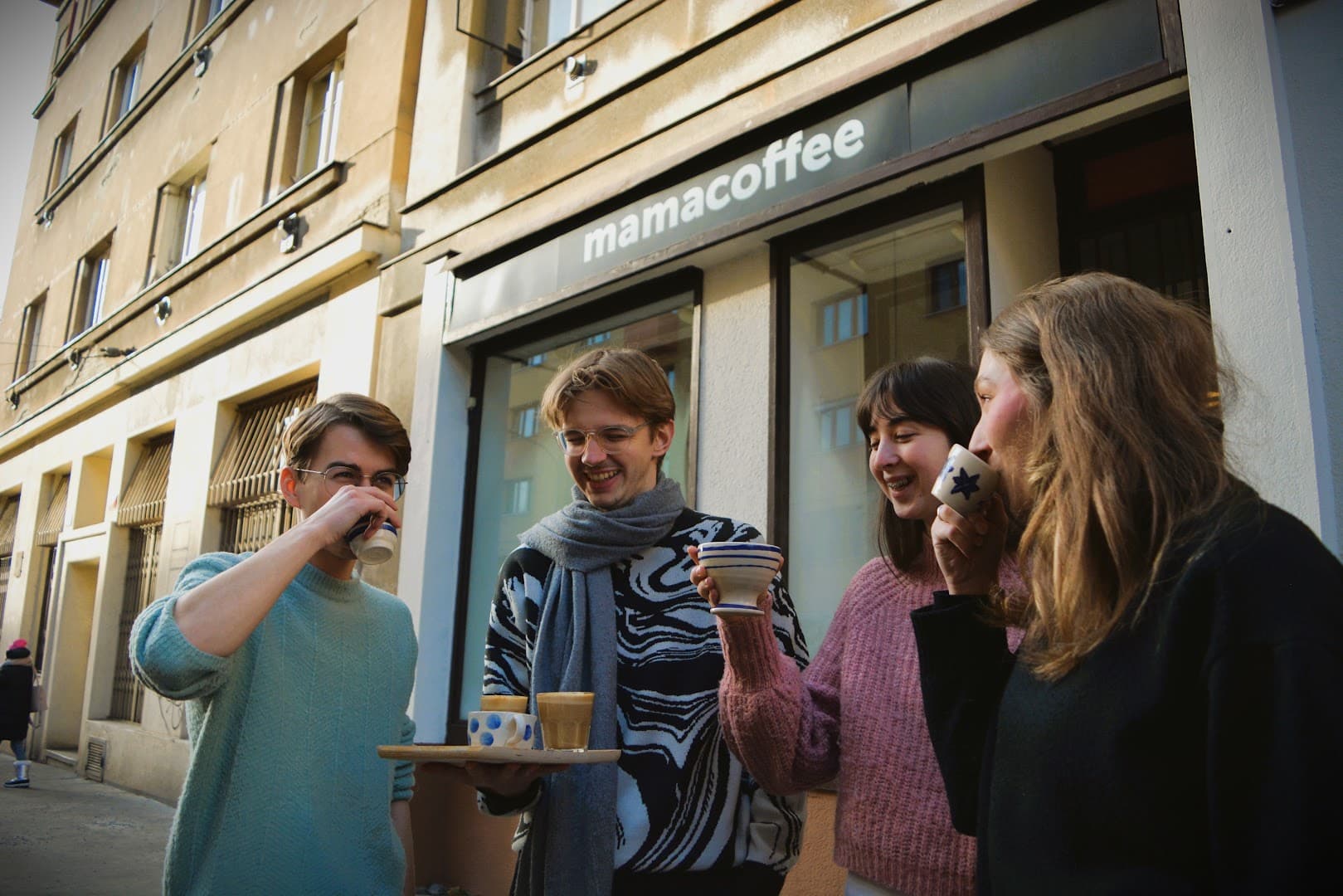 Storefront of mamacoffee Podolská, specialty coffee shop in Prague