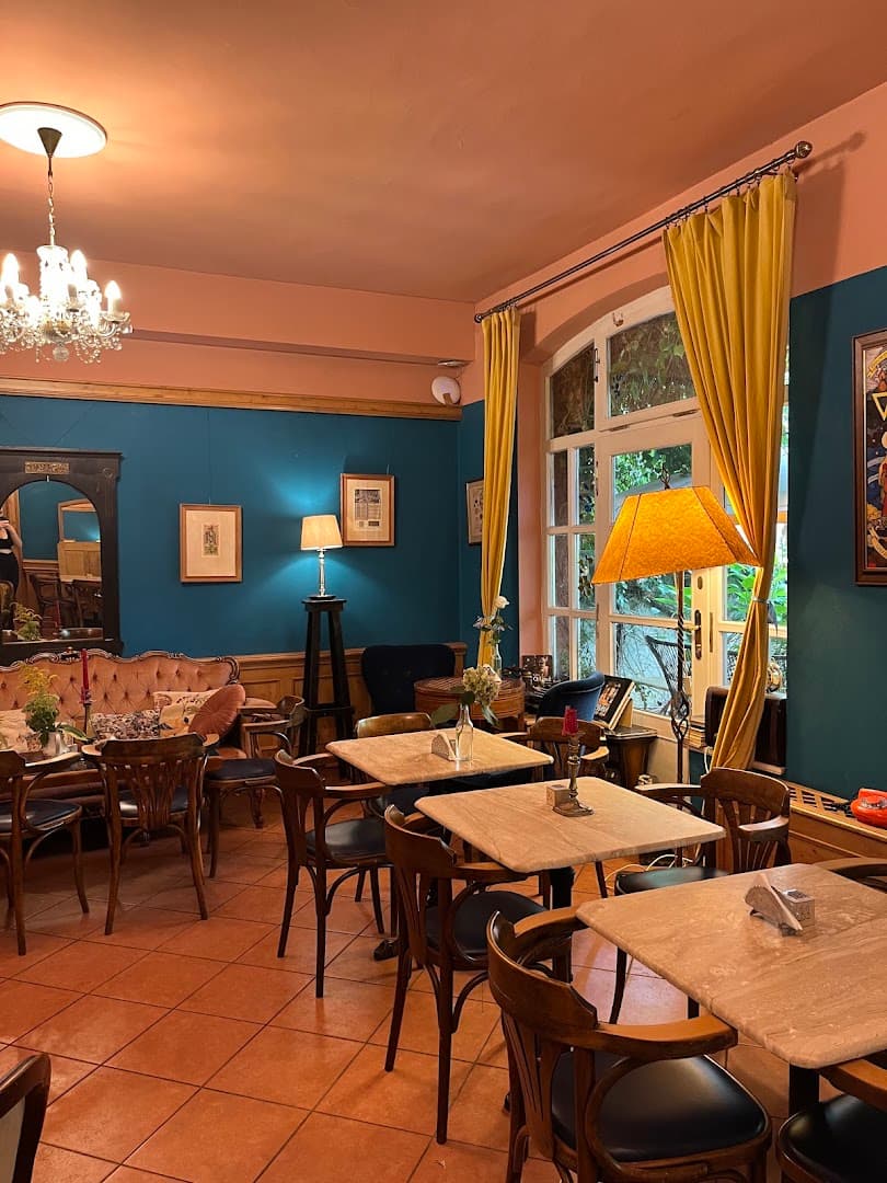 Interior of Cukrárna Alchymista, specialty coffee shop in Prague