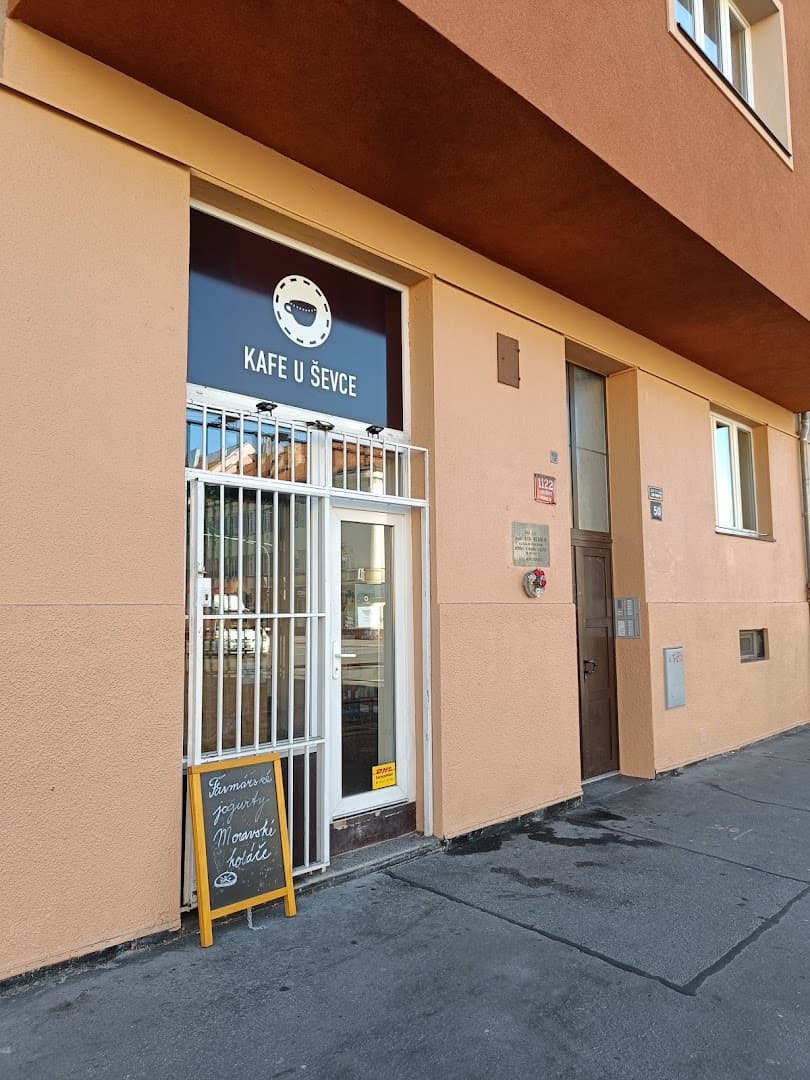 Storefront of Kafe U Ševce, specialty coffee shop in Prague