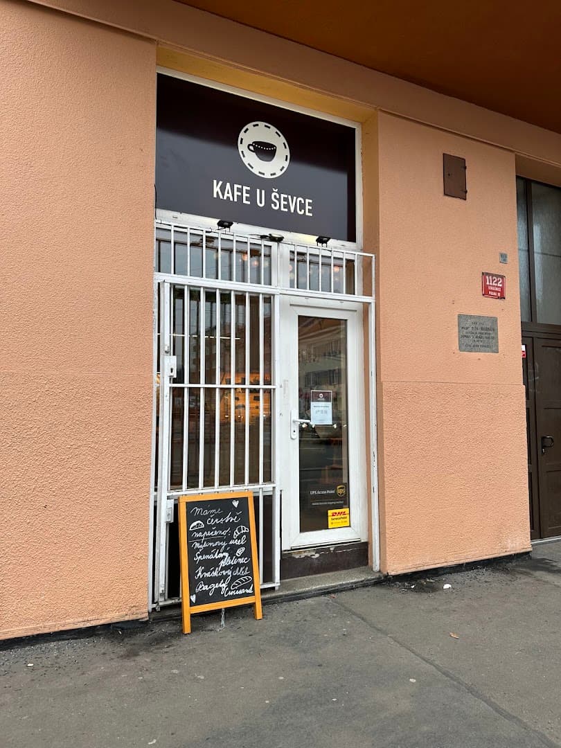 Storefront of Kafe U Ševce, specialty coffee shop in Prague
