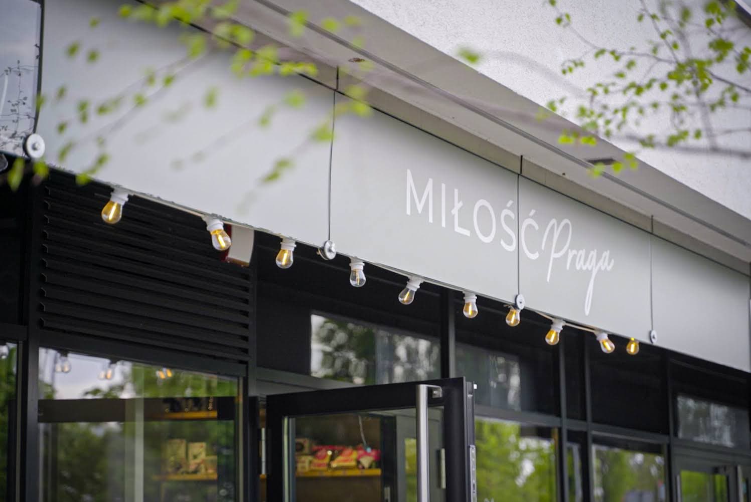 Signage at MIŁOŚĆ, specialty coffee shop in Warsaw