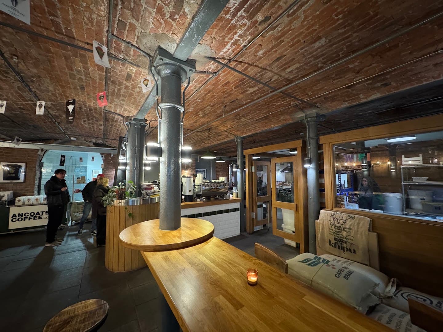 Interior of Ancoats Coffee Co., specialty coffee shop in Manchester