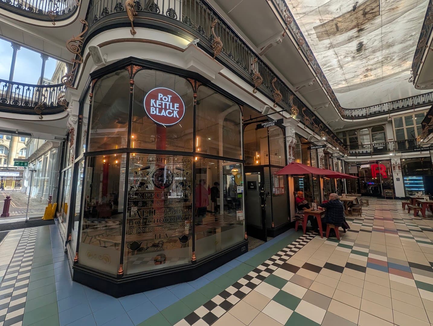Storefront of POT KETTLE BLACK Barton Arcade, specialty coffee shop in Manchester